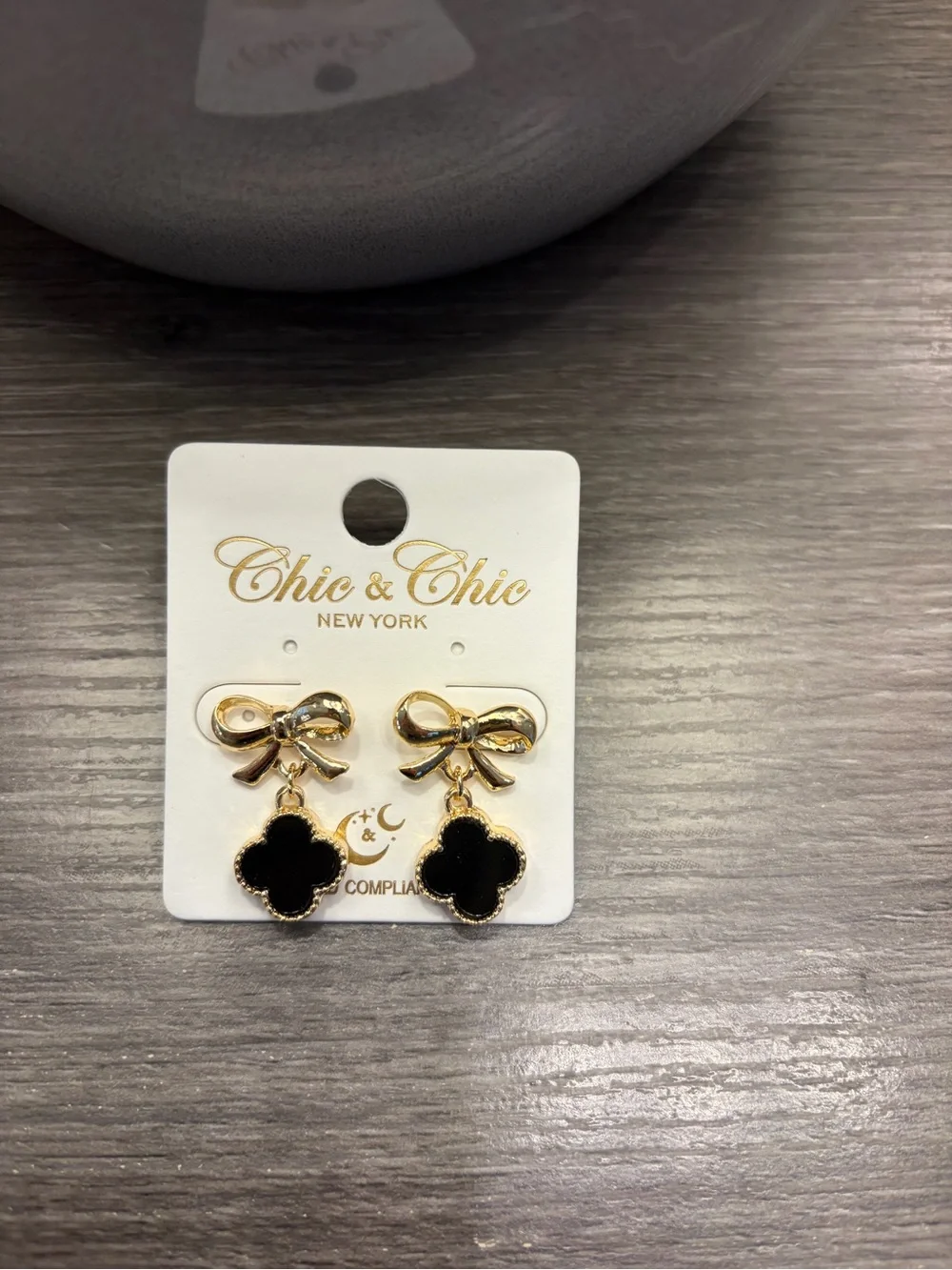 New Boutique Black Enamel Clover Shaped Earrings with Gold Tone Bows - Picture 2 of 2